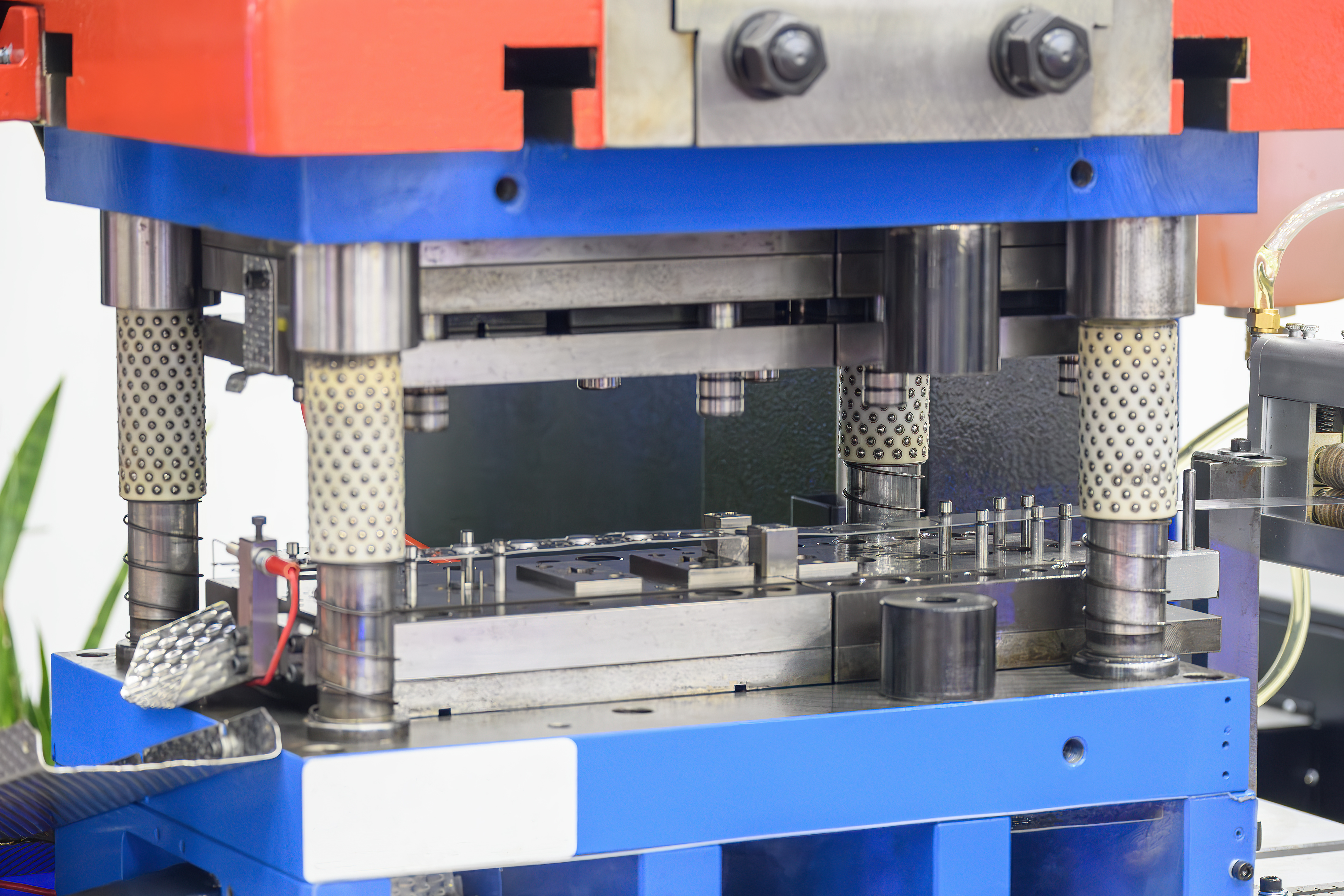 blue and orange hydraulic press